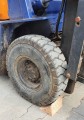 solid and rigid natural cork wedges under the wheels of a forklift trucks.jpg
